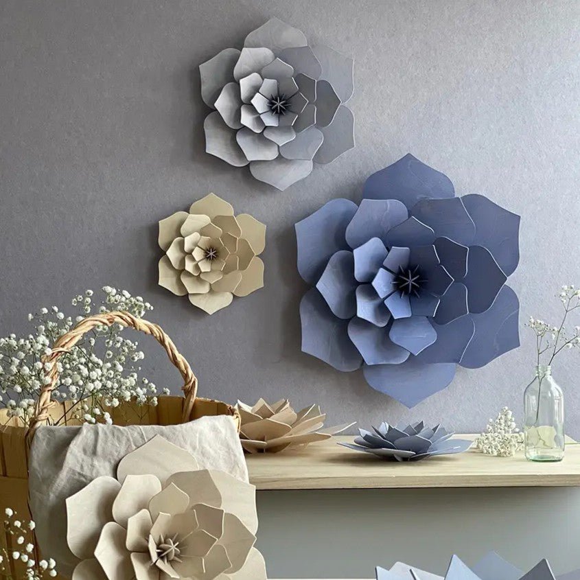 Handcrafted 3D floral wall and table decor in shades of blue and beige, perfect for elegant interiors and special occasions.